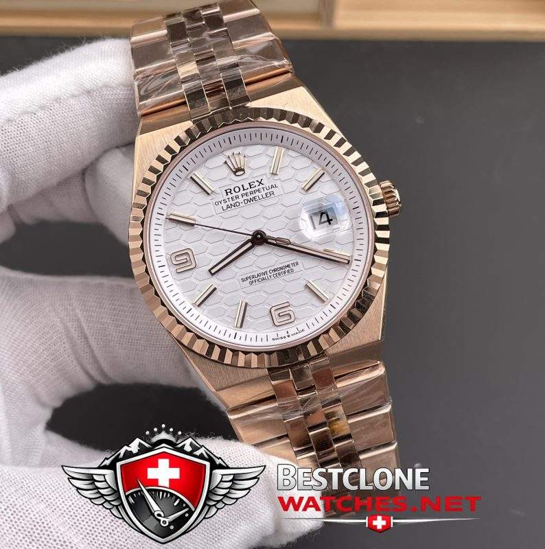 ES Rolex Land Dweller Rose Gold Dial Close Up (Honeycomb Texture)